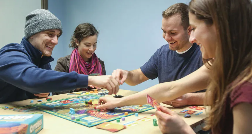 People playing board games