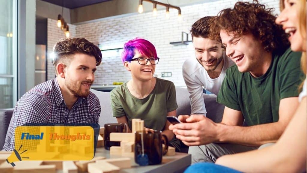 people gathered around jenga board game